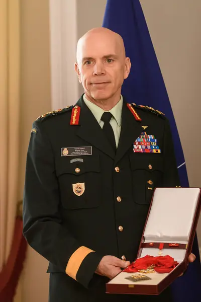 stock image RIGA, LATVIA. 13th May 2024. Edgars Rinkevics, President of Latvia presents the highest honor of Latvia - Viesturs order to Wayne Eyre )at photo), General Chief of the Defence Staff of Canada.