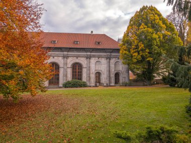 Beautifully colored autumn gardens at Prague Castle with views of St. Vitus or Palace of the Castle. Prague, Czech Republic