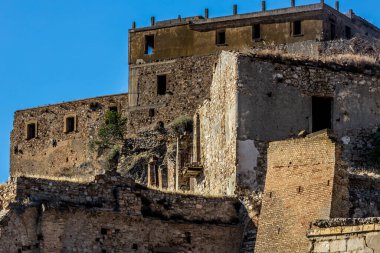 Abandoned ruins of the ghost town of Craco. A city abandoned due to an earthquake in the late 20th century. Province of Matera, Basilicata, Italy clipart