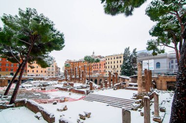 The snow covered sacred area of Largo Argentina, Rome, Italy clipart