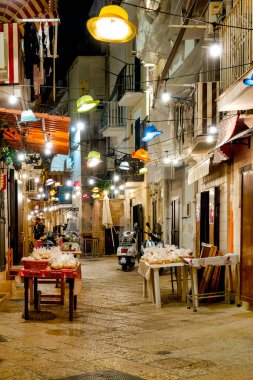 Strada Arco Basso (or Via delle Orecchiette) at night, Bari, Italy    clipart