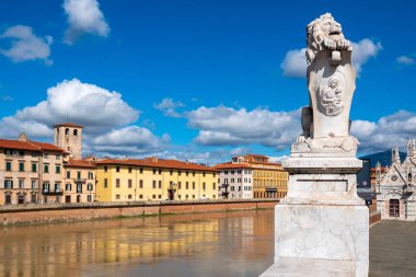  Marble lion statue holding a coat of arms, located near Ponte Solferino on Lungarno Gambacorti in Pisa, Italy. clipart