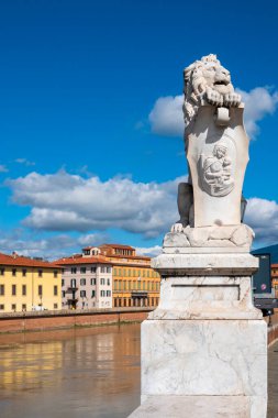  Marble lion statue holding a coat of arms, located near Ponte Solferino on Lungarno Gambacorti in Pisa, Italy. clipart