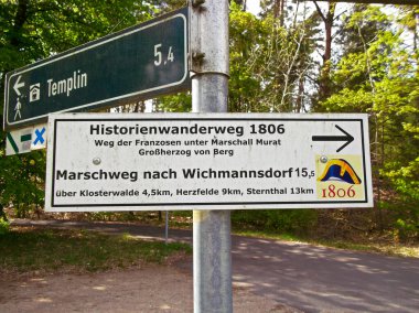 Boitzenburg in der Uckermark, Brandenburg / Germany - April 27, 2024: Sign with the inscription Historienwanderweg 1806Path of the French under Marshal Murat - Grand Duke of Berg clipart