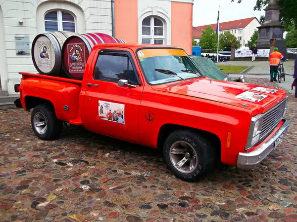 stock image City of Templin in the Uckermark, Brandenburg / Germany - June 15, 2024: Vehicle with two barrels and inscription - But Spencer - Spencer Hill Festival 2025