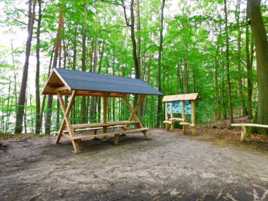 Rest area on the hiking and cycling path clipart