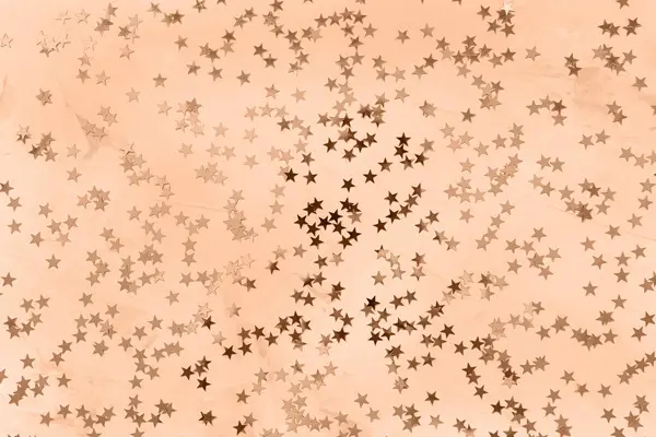2024年桃福丝的颜色 流行的颜色 有星星的圣诞抽象背景 免版税图库图片