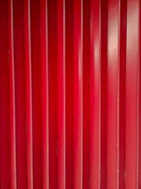 Kırmızı desenli metal duvar dokusu. Çizgili Demir Çit Kusursuz Desen.