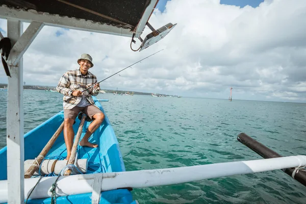 Smiling Angler Sitting End Boat Holding Fishing Rod Small Fishing — Stockfoto