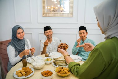 dates brought to serve at iftar with friends at the dining table