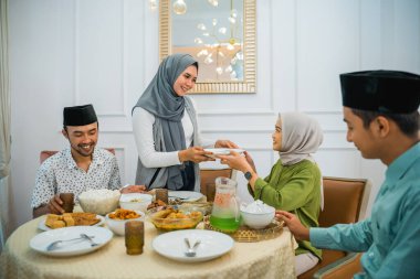 portrait happy family when breaking fast dinner together in the dining room