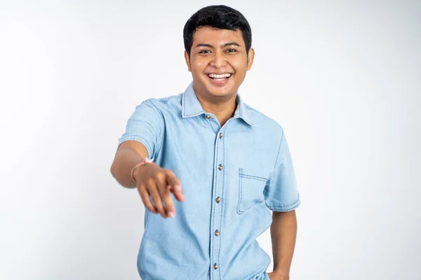 Portrait Smiling Young Asian Man Pointing Camera Isolated Background — Stock Photo, Image
