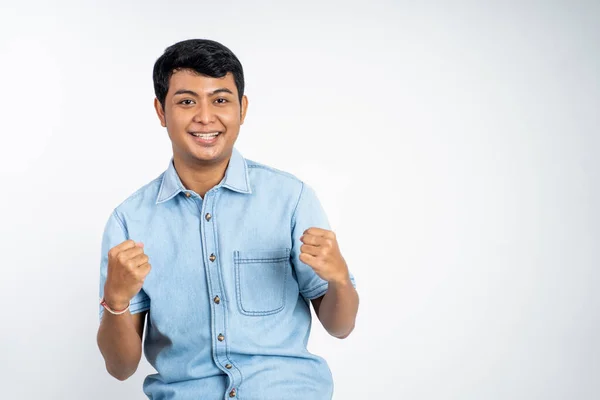 Portrait Excited Young Asian Man Clenched Fists Isolated Background — Stock Photo, Image