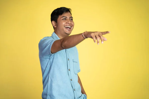 Portrait Young Asian Man Stands Laughing Pointing Hand Isolated Background — Stock Photo, Image