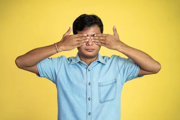 Young Asian Man Serious Covering Eyes Two Hands Isolated Background — Stock Photo, Image