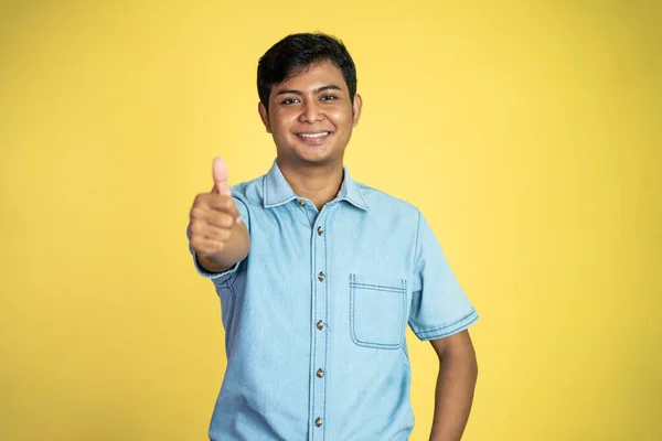 Portrait Young Asian Man Stand Thumbs Yellow Background — Stock Photo, Image