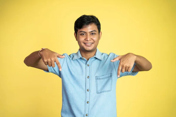Portrait Smiling Asian Man Finger Pointing Downward Isolated Background — Stock Photo, Image