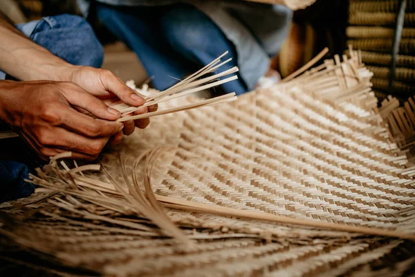 close up photo of hand woven a bamboo product