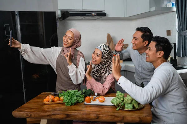 Three Friend Hijab Looking Phone Searching New Recipe Dinner — Stok Foto
