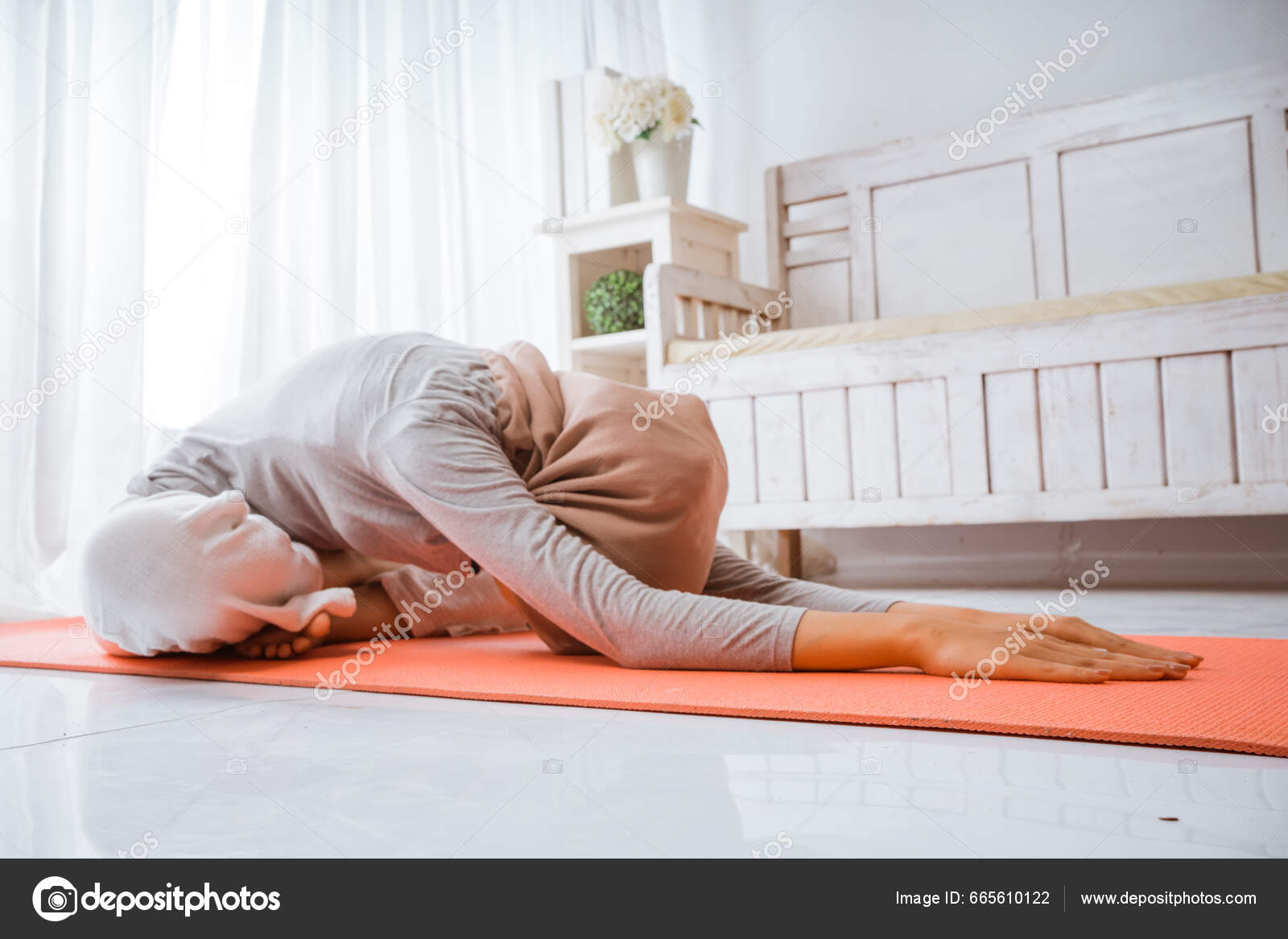 Asian Muslim Woman Instructor Wearing Hijab Doing Yoga Pilates