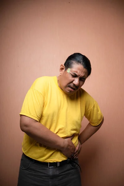 Old Asian Man Suffering Stomachache Clenching Stomach Pain Expression Plain — Stock Photo, Image