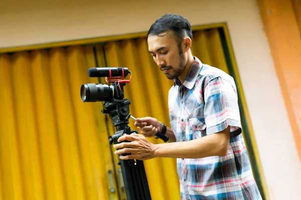 Handsome Cameraman Plaid Shirt Preparing His Shooting Equipment Seriously — Stock Photo, Image