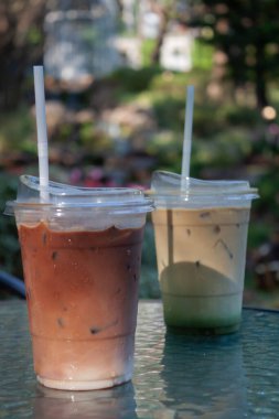Iced coffee with nature background, stock photo