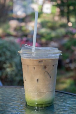 Iced coffee with nature background, stock photo