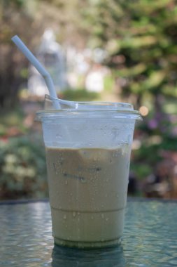 Iced coffee with nature background, stock photo