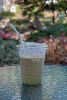 Iced coffee with nature background, stock photo