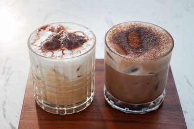 Iced coffee with micro foam in coffee shop, stock photo