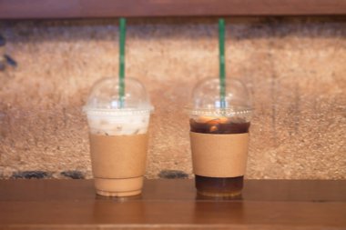 Iced coffee with orange in coffee shop, stock photo