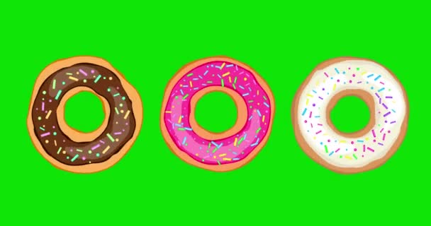 Diverse Kleurrijke Donuts Met Glazuur Bestrooid Met Korrels Groene Achtergrond — Stockvideo