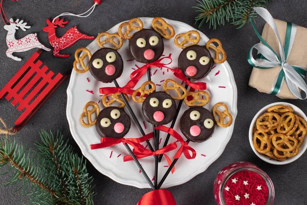 Cake Pops Santas Reindeers Made Cookies Chocolate Crackers White Plate — Stock Photo, Image