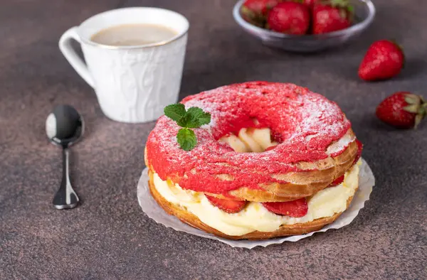 stock image French cake Paris-Brest made from choux pastry, strawberry and custard