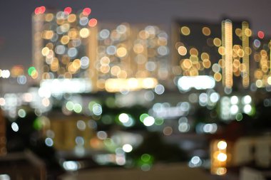 Gece arkaplan dokusundaki soyut Bokeh şehri