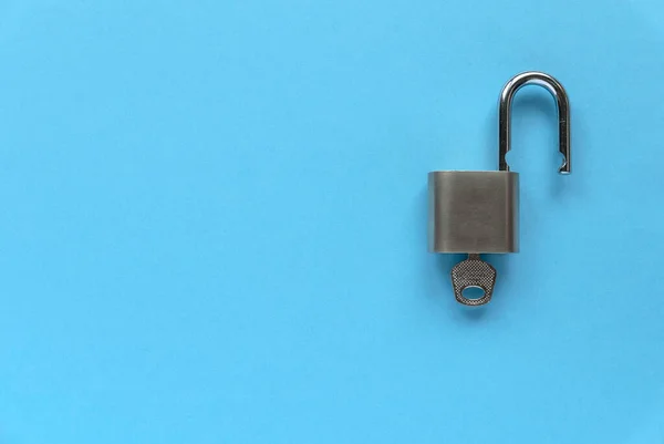 stock image Computer security concept. Unlocked padlock on blue background with copy space.Computer is protected from online cybercrime and hacking