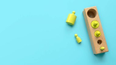 Eğitici oyuncaklar, bilişsel beceriler, çocuk gelişimi mantıklı düşünme konsepti. Montessori ahşabı oyuncakları mavi bir arkaplan üzerinde şekillendirir. Farklı şekil ve boyutlarda ayırır..