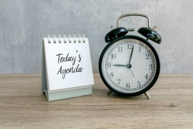 Staying on Track: The Importance of 'Today's Agenda' with an Alarm Clock for Productivity clipart