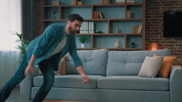 Exhausted Caucasian Man Jumping Soft Couch Living Room Falling Comfortable — Stock Video