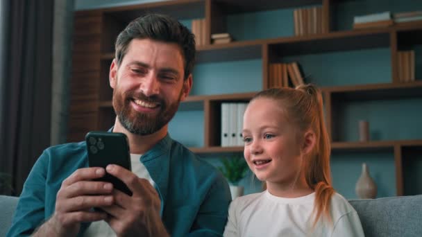 Cute Kid Preschool Girl Child Looking Smartphone Screen Father Adult — Stock Video