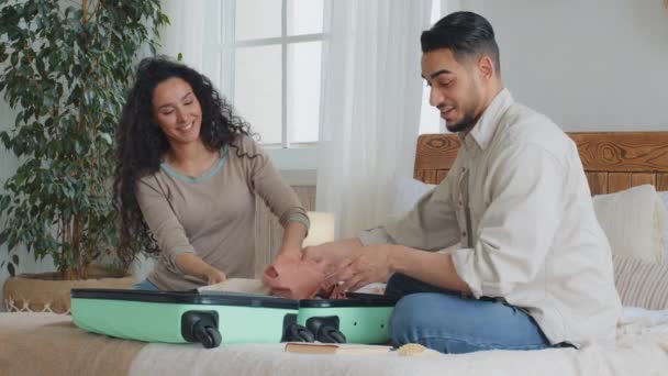 Hispanic Latina Indian Married Couple Woman Man Sitting Bedroom Suitcase — Stock Video