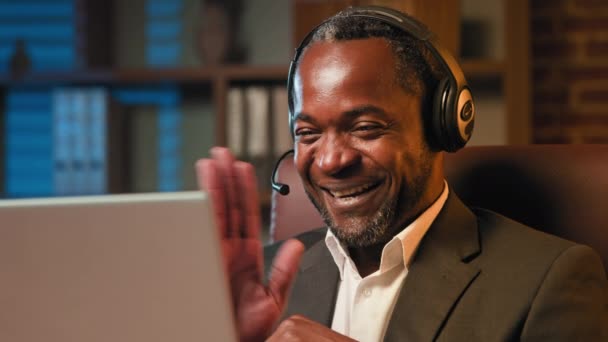 Adult Business African Man Talking Video Call Laptop Using Headset — Vídeo de Stock