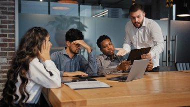 Business conflict quarrel misunderstanding. Multiracial angry businessmen and businesswoman arguing in office disputing confrontation at workplace aggressive multiethnic workers shouting discuss idea