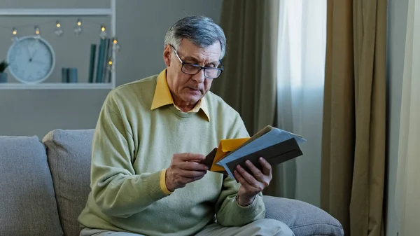 Old 60S Elderly Caucasian Man Checking Postal Letters Home Mature — Foto Stock