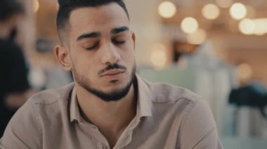 Close up sad upset stressed ill sick guy bearded man suffer with headache pain businessman entrepreneur anxious bad problem business failure bankrupt breakup end of career money lost sleepy tired male
