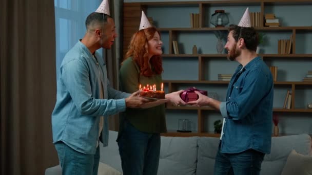 Ethnic Couple Congratulating Adult Friend Wishing Happy Birthday Presenting Gift — Vídeos de Stock