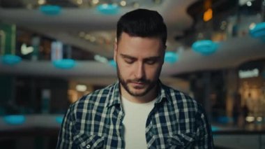 Surprised happy businessman caucasian man male client shopper look at bags with presents win surprise gift on birthday get delivery packages purchases from shop supermarket buy cloth in shopping mall