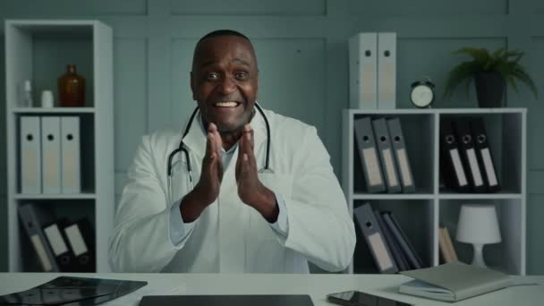 Happy African American Man Doctor Look Web Camera Talking Online — стоковое видео