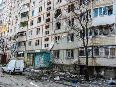 Kharkiv, Kharkov, Ukraine - 05.07.2022: outside view destroyed building burnt house broken windows damaged flats Ukrainian ruined city bombing by russian invasion consequences of war missile attack